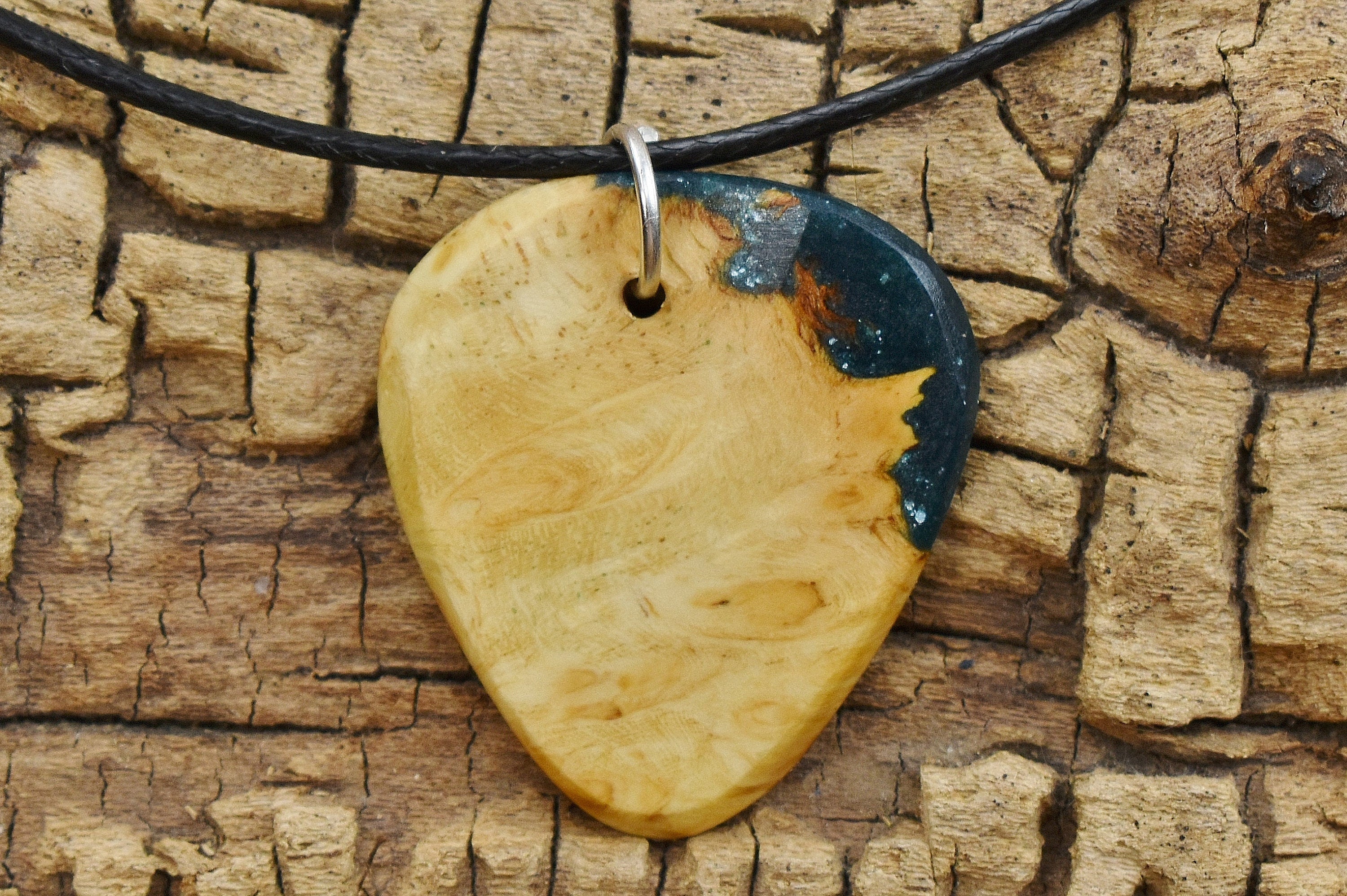 Handmade Afzelia Burl Guitar Pick Pendant: Emerald Green Resin Necklace