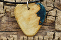 Afzelia Burl Guitar Pick Pendant: Emerald Green Resin Wood Necklace