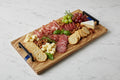 Blue Resin Charcuterie Board: Figured Italian Olivewood, Live Edge